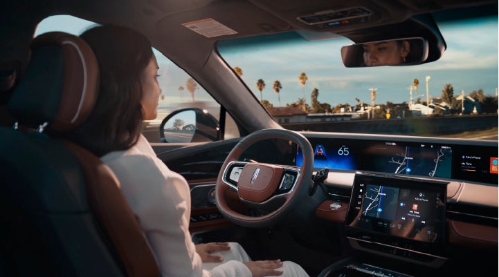 A person is shown driving hands-free on the highway with available Lincoln BlueCruise technology. | Bluebonnet Motors Lincoln in New Braunfels TX