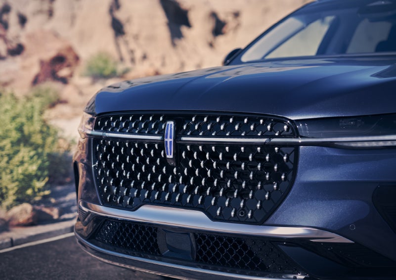 The stylish grille of a 2024 Lincoln Nautilus® SUV sparkles in the sunlight. | Bluebonnet Motors Lincoln in New Braunfels TX