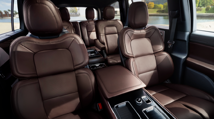 The cabin of the 2025 Lincoln Aviator® SUV is shown with black and brown accents. | Bluebonnet Motors Lincoln in New Braunfels TX