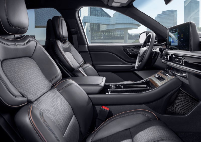 The interior of the 2025 Lincoln Aviator® SUV is shown with sleek black accents. | Bluebonnet Motors Lincoln in New Braunfels TX