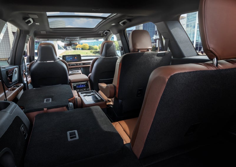 The interior of the 2025 Lincoln Aviator® SUV is shown with two seats folded down for added space. | Bluebonnet Motors Lincoln in New Braunfels TX