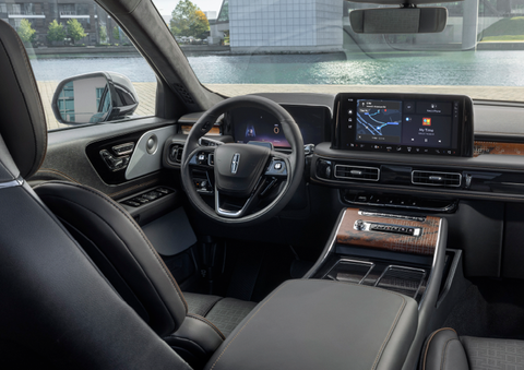 The interior of the 2025 Lincoln Aviator® SUV is shown parked with a view of a harbor through the windshield. | Bluebonnet Motors Lincoln in New Braunfels TX