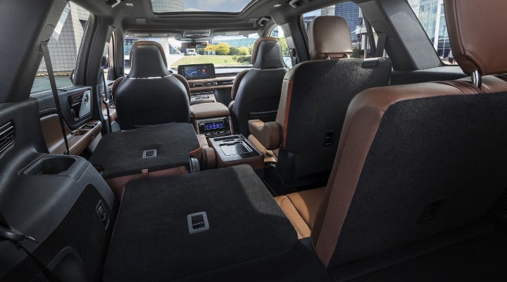 One side of the PowerFold® third-row seat and a second-row seat are folded forward in the 2026 Lincoln Aviator® SUV. | Bluebonnet Motors Lincoln in New Braunfels TX