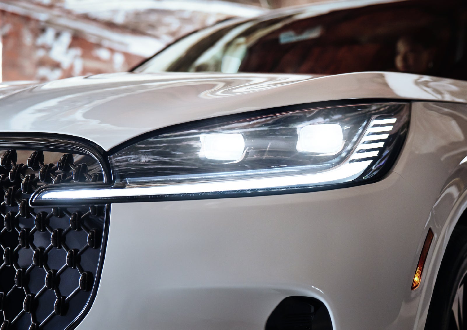 A close-up of a headlamp on the 2027 Lincoln Aviator® SUV is shown. | Bluebonnet Motors Lincoln in New Braunfels TX